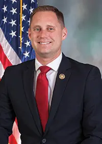 Professional portrait with flag background