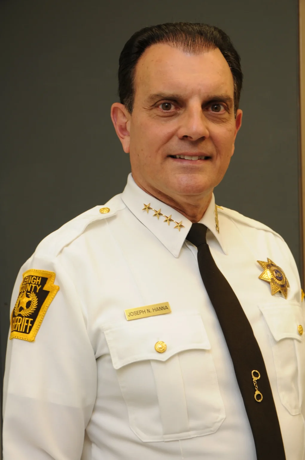 Uniformed sheriff posing confidently